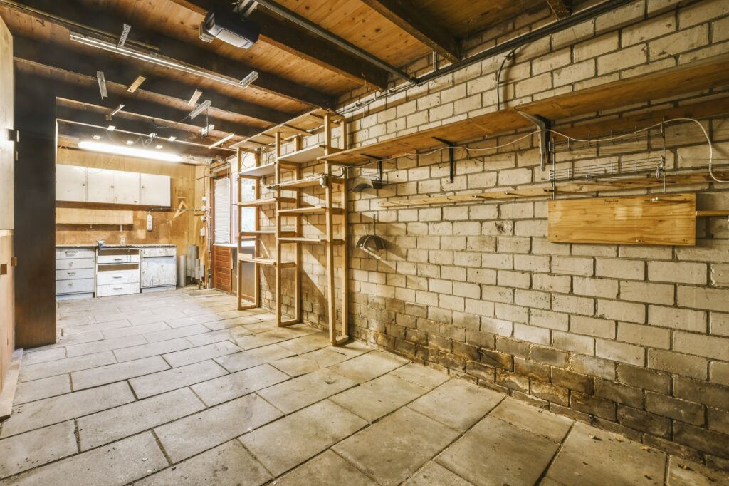 Spacious garage with brick walls